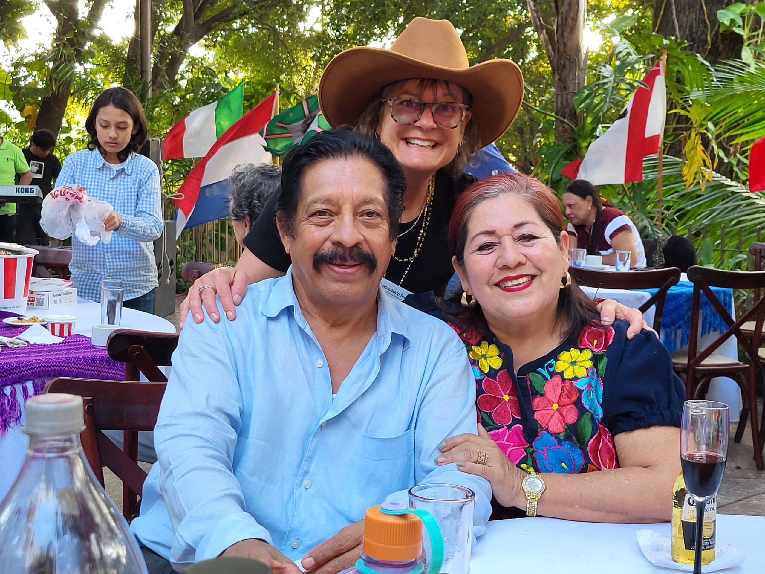 Three people at a restaurant